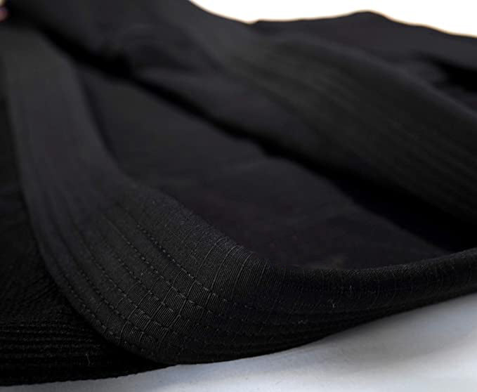 Close-up of black Rewon Ju Jutsu Gi fabric, ideal for box training and fitness, includes free white belt, durable for competition use.