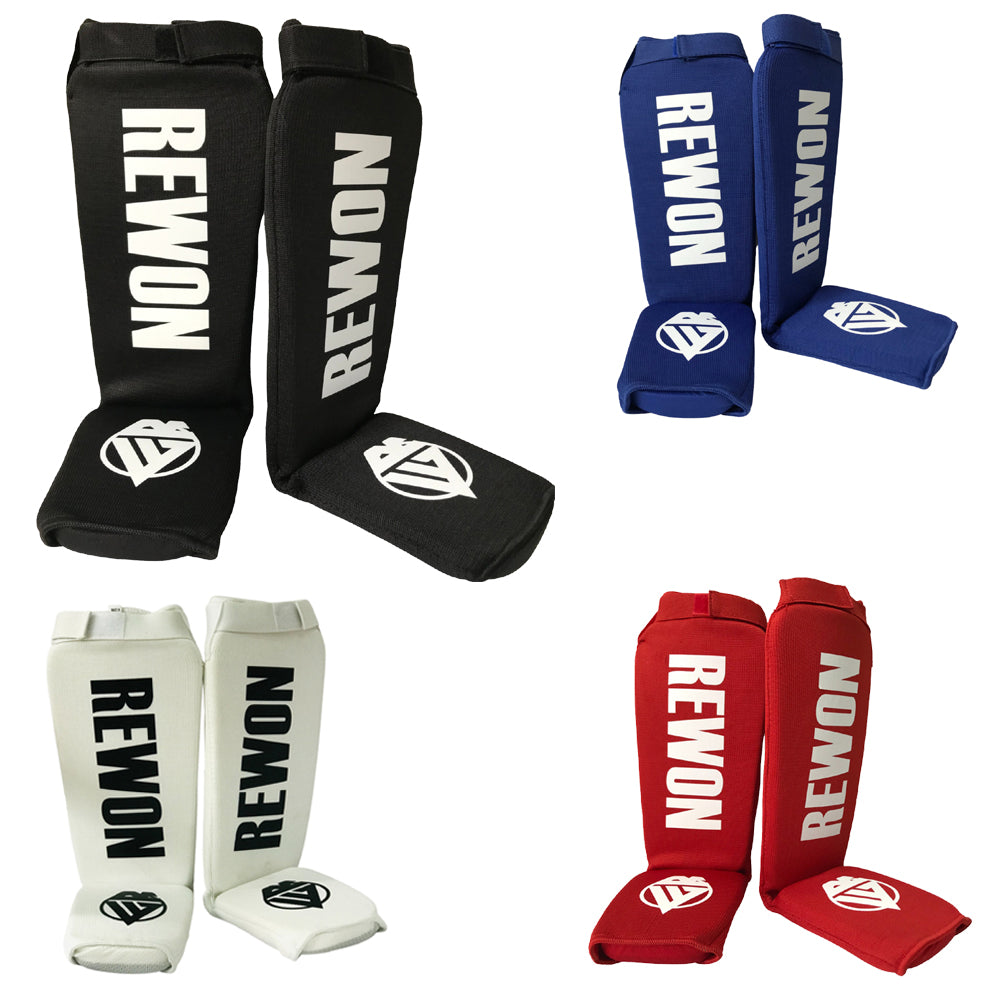 Rewon Muay-Thai Schienbeinschoner für Kickboxen in Schwarz, Blau, Weiß und Rot – Komfortable Passform, ideal für Boxtraining.