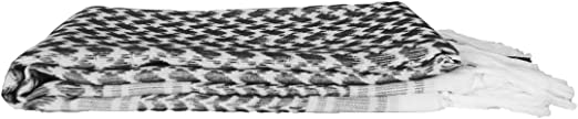 Black and white shemagh scarf folded, versatile for boxing training, fitness gear, or as a cooling wrap in hot conditions.