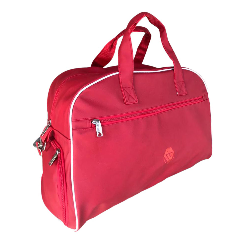 Red sports bag with side pocket and shoe compartment, ideal for boxing and fitness gear. Durable and stylish, 35L capacity.